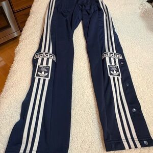 Adidas Dark Blue Track Pants with White Stripes | Iconic snap button side panels